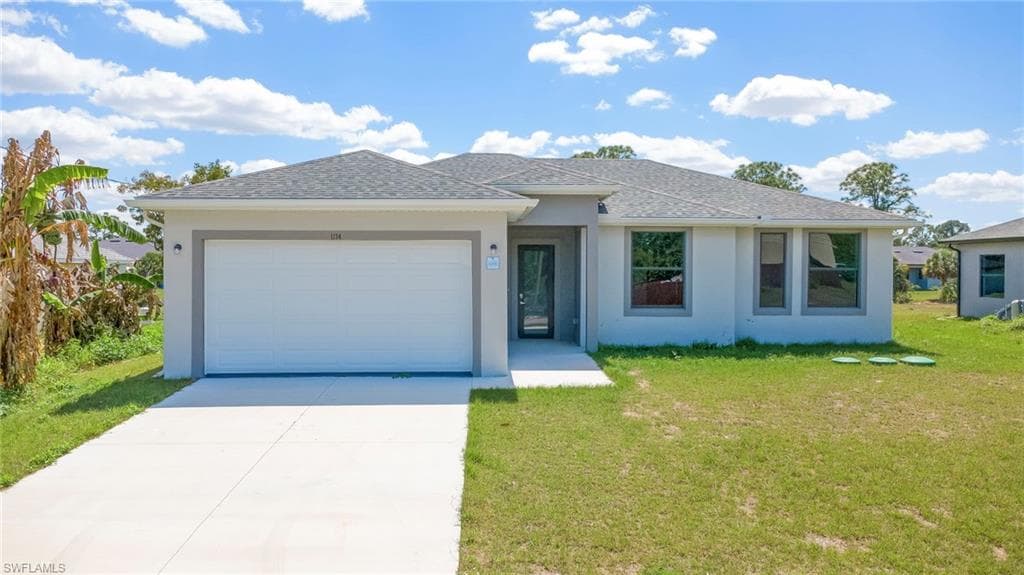 1134 Cumming ST E LEHIGH ACRES, FL 33974