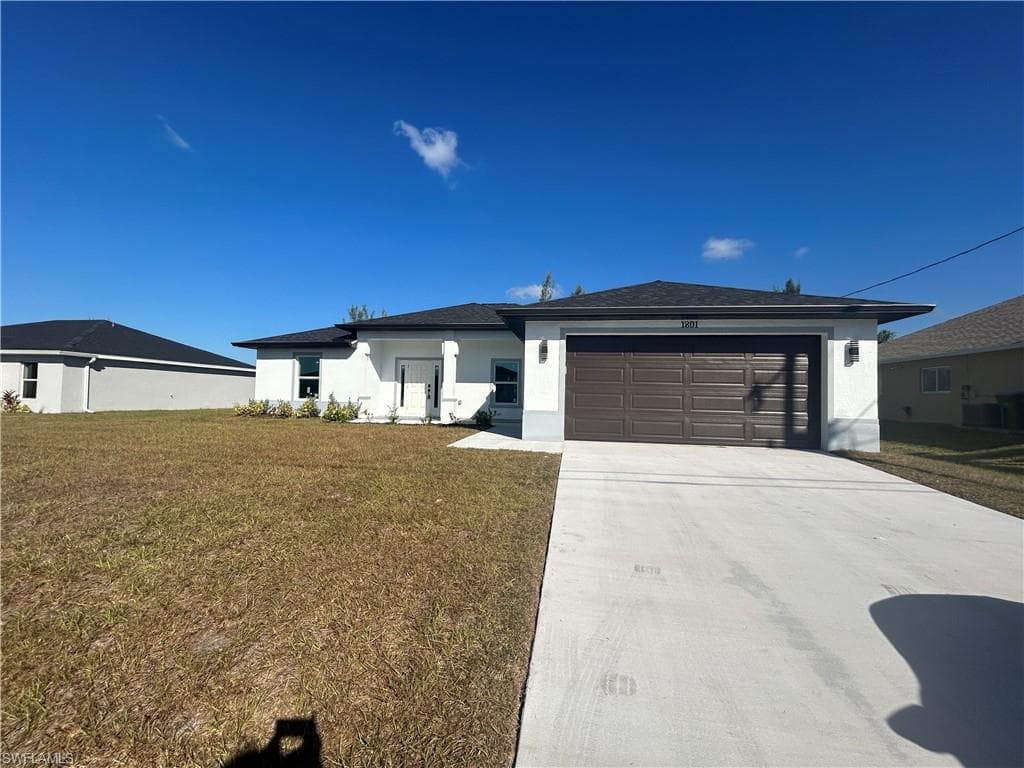 1801 NW 13th TER CAPE CORAL, FL 33993