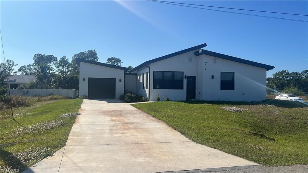 714 Chambers ST E LEHIGH ACRES, FL 33974