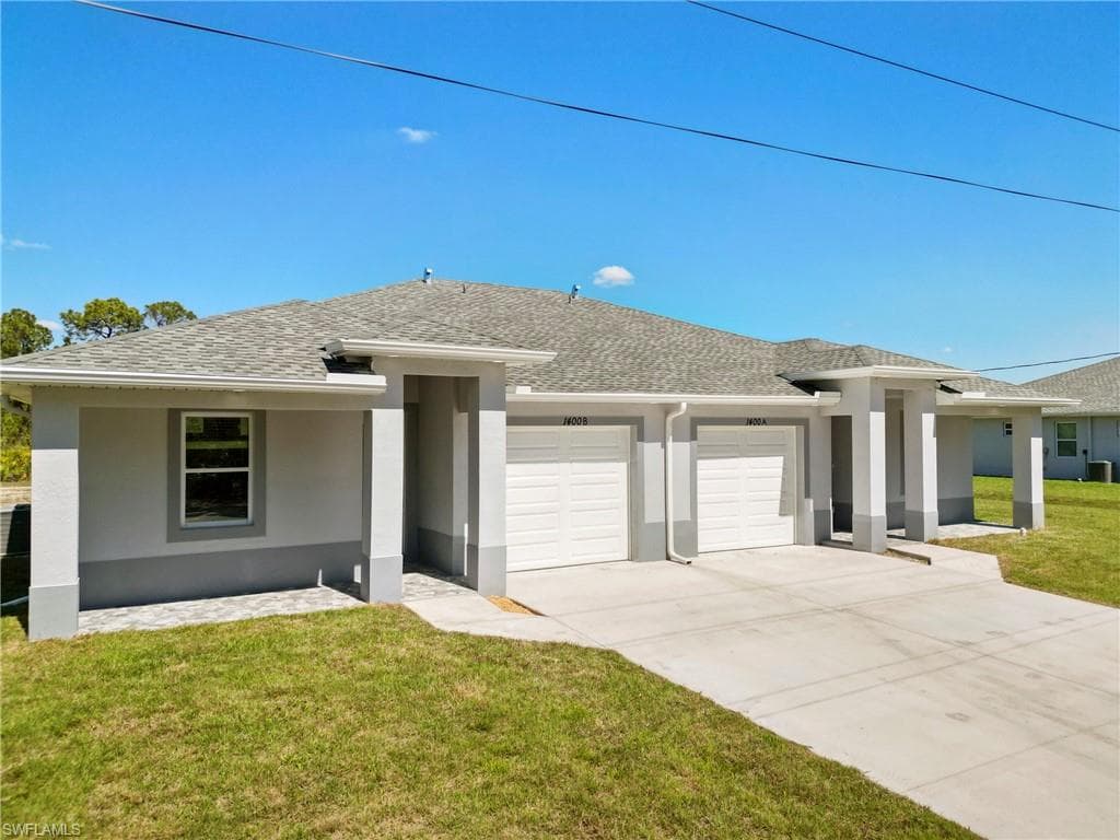 1404/1406 W 12th ST LEHIGH ACRES, FL 33972