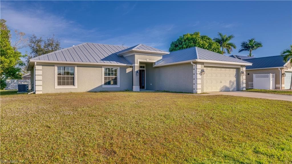 411 SE 19th TER CAPE CORAL, FL 33990