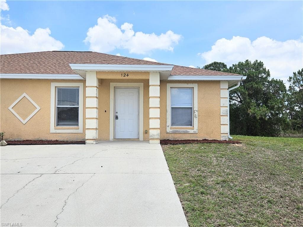 124 Ivan AVE S LEHIGH ACRES, FL 33973