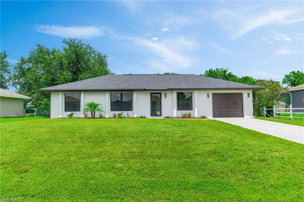 3206 12th ST W LEHIGH ACRES, FL 33971