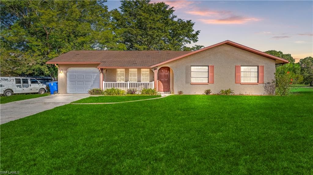 703 Adams AVE LEHIGH ACRES, FL 33936