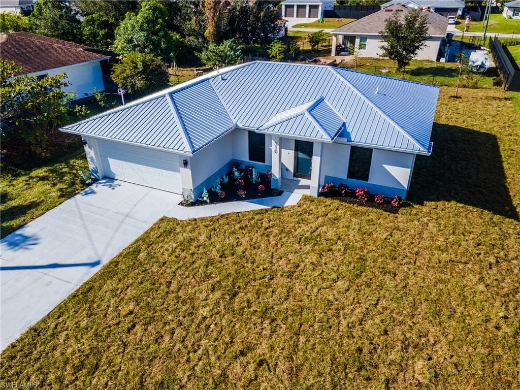 310 NW 16th PL CAPE CORAL, FL 33993
