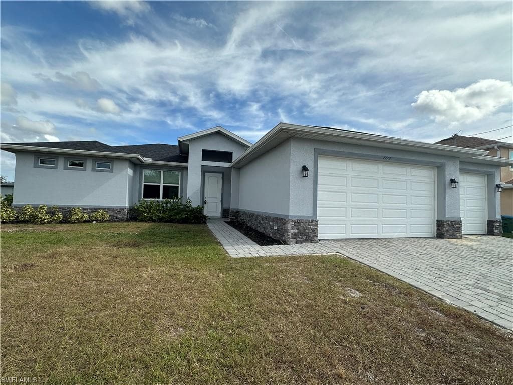 1717 NW 6th AVE CAPE CORAL, FL 33993