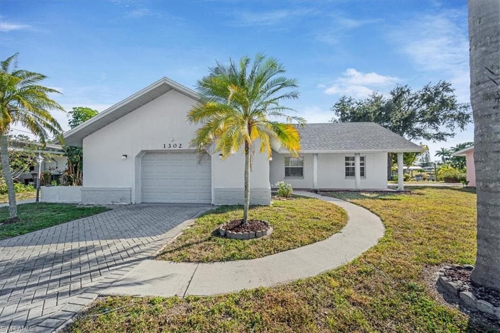 1302 NE 4th TER CAPE CORAL, FL 33909