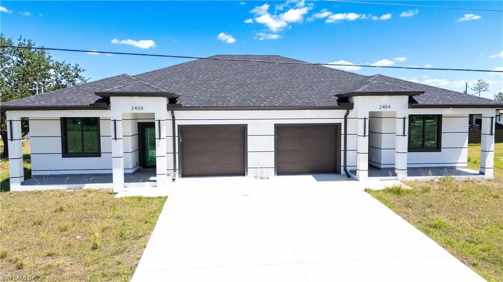 2404/2406 Crawford AVE N LEHIGH ACRES, FL 33971