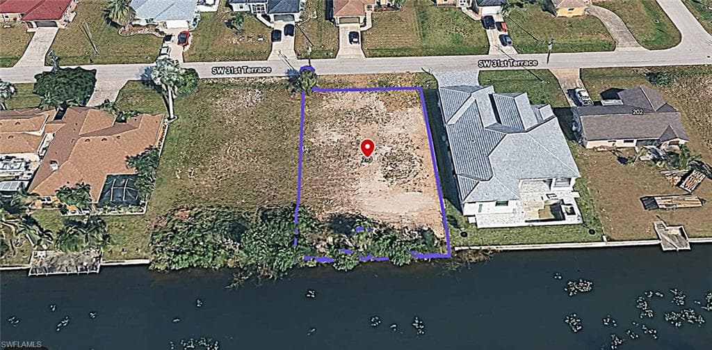 210 SW 31st TER CAPE CORAL, FL 33914