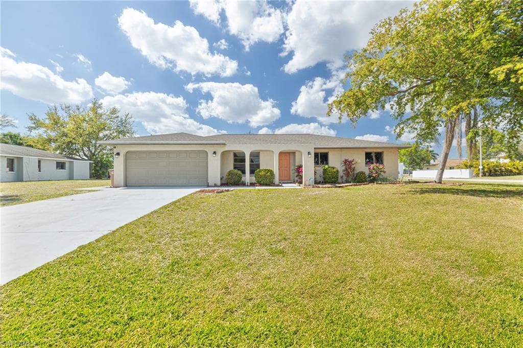 1628 Country Club BLVD CAPE CORAL, FL 33990