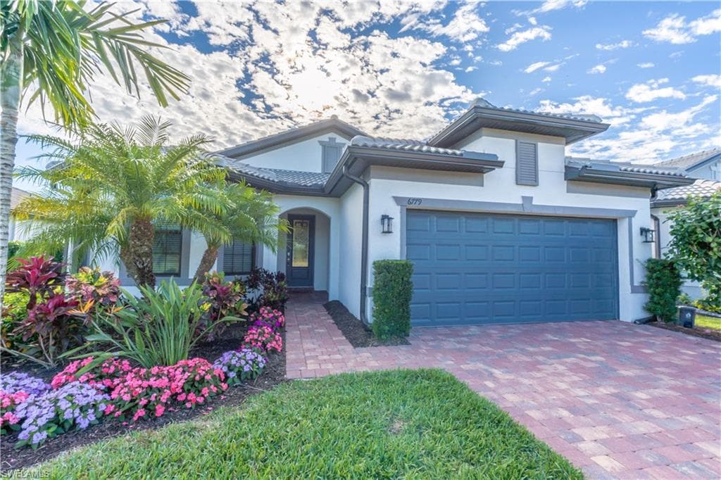 6779 Winding Cypress DR NAPLES, FL 34114