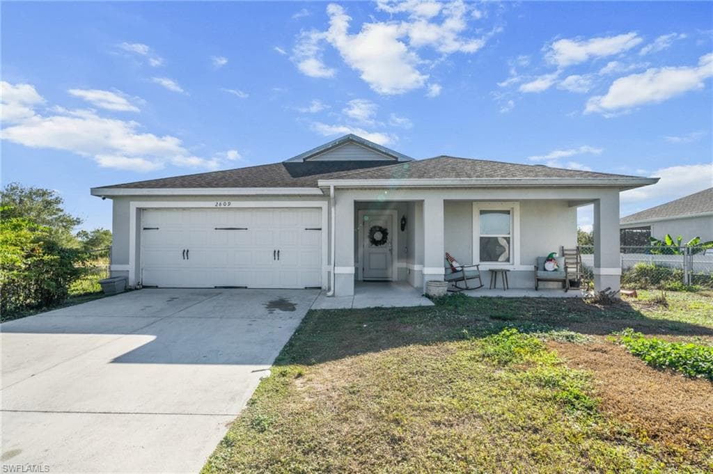 2609 25th ST W LEHIGH ACRES, FL 33971