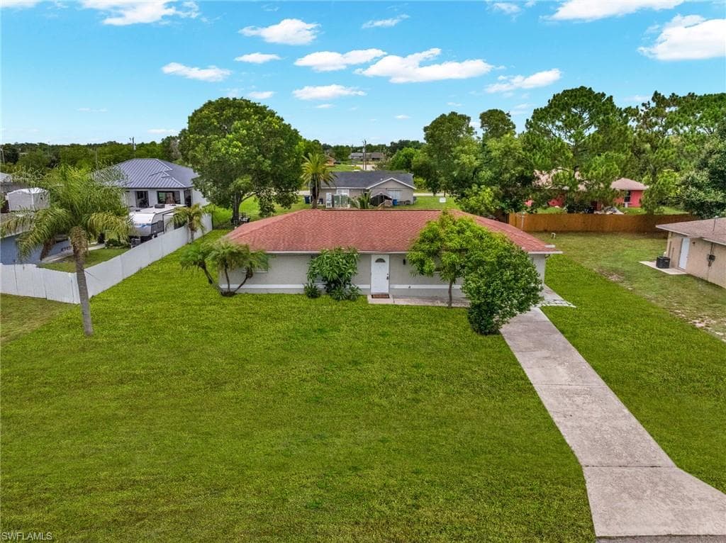 909 Sally AVE N LEHIGH ACRES, FL 33971