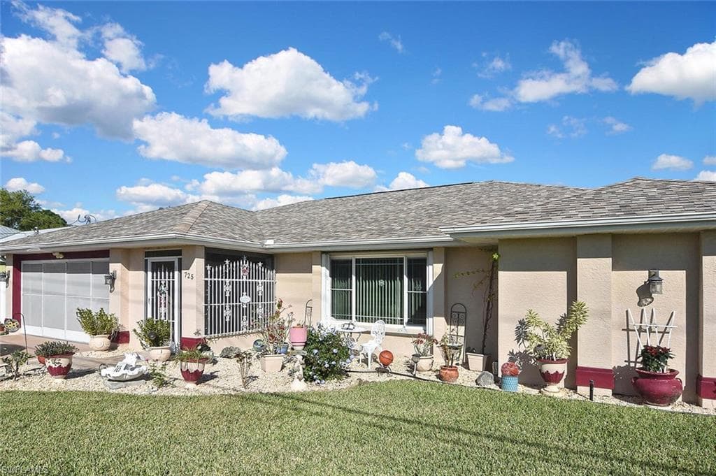 725 Milwaukee BLVD LEHIGH ACRES, FL 33974