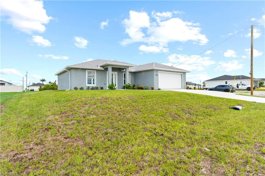 1702 Nelson RD N CAPE CORAL, FL 33993