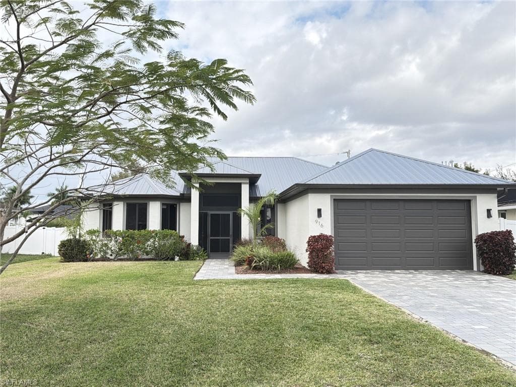 916 SW 7th AVE CAPE CORAL, FL 33991
