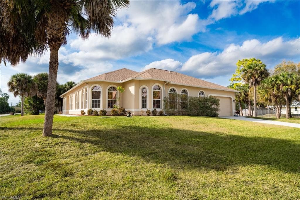 703 Plumosa AVE LEHIGH ACRES, FL 33972