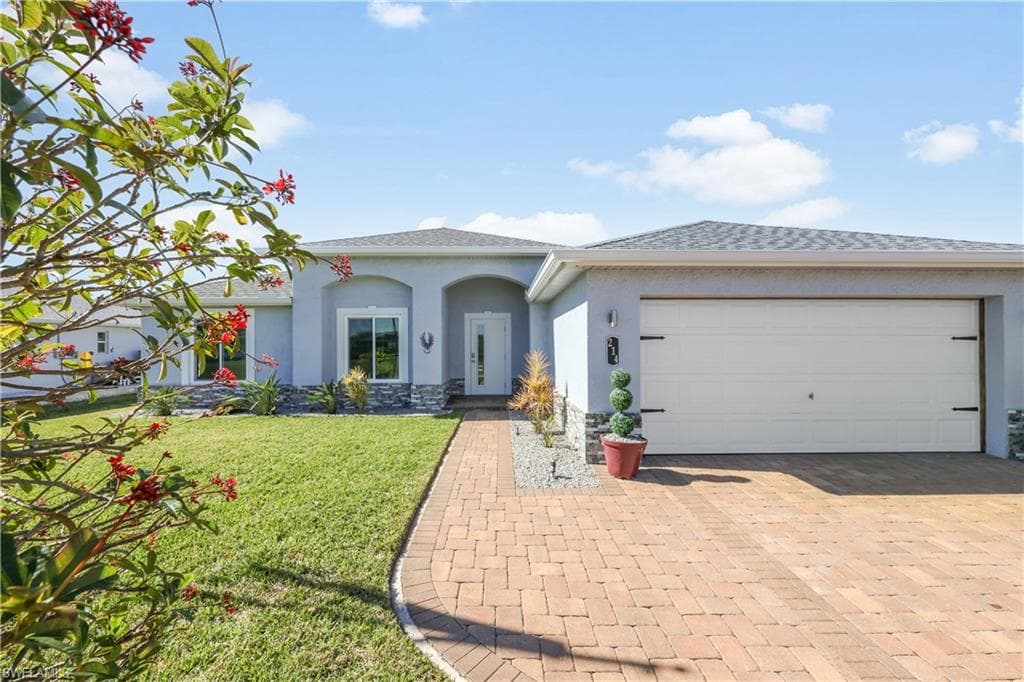 214 NW 25th AVE CAPE CORAL, FL 33993