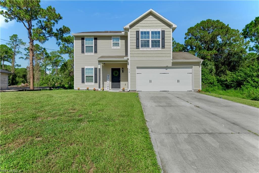 218 Lomax AVE S LEHIGH ACRES, FL 33974