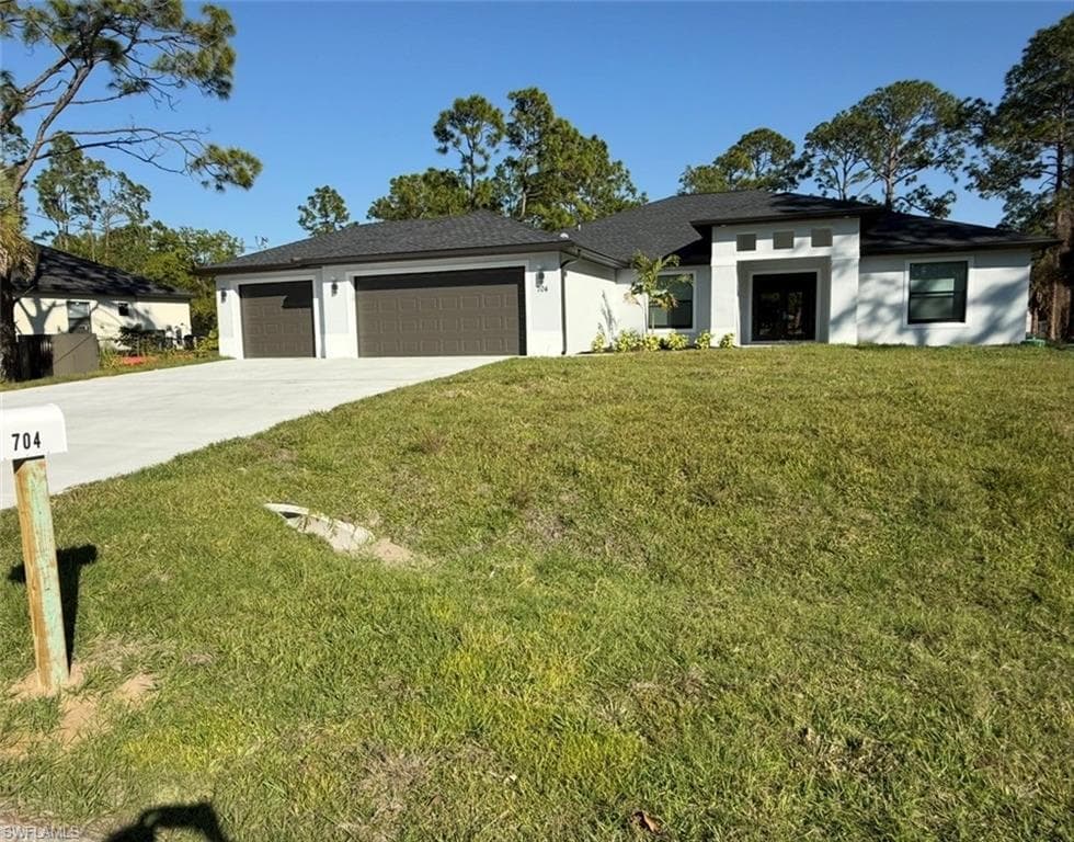 704 Cortez AVE LEHIGH ACRES, FL 33972