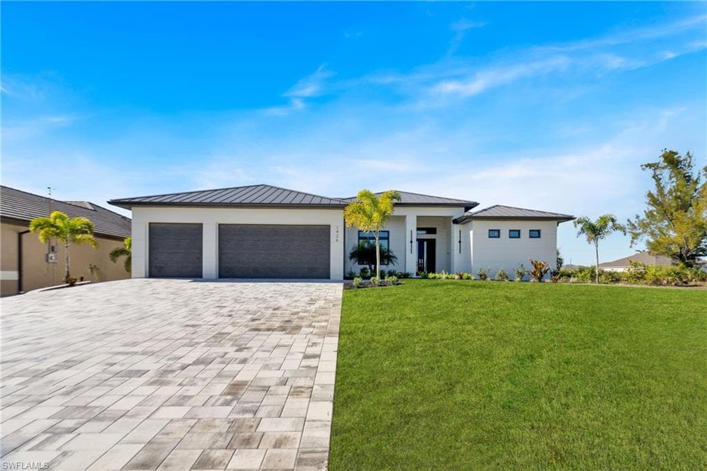 1426 NW 39th AVE CAPE CORAL, FL 33993