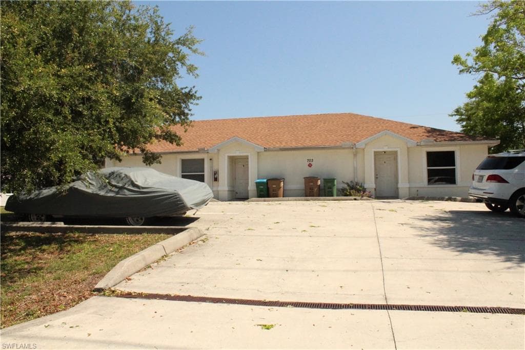 703 SE 8th TER CAPE CORAL, FL 33990