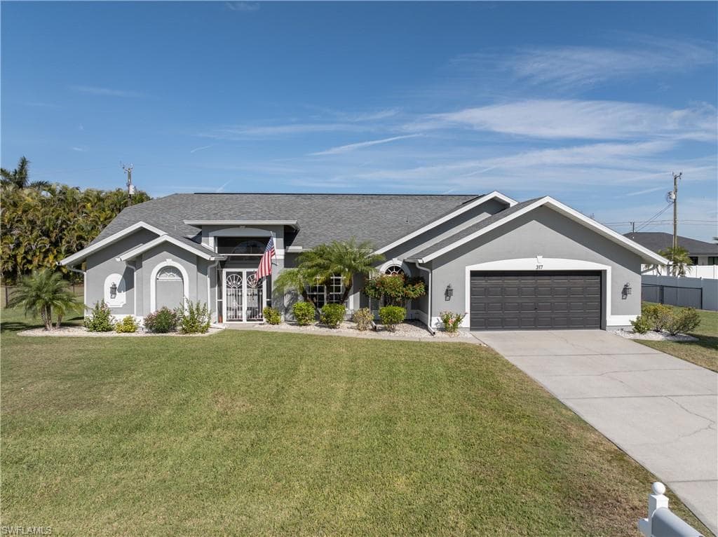 317 SE 13th TER CAPE CORAL, FL 33990