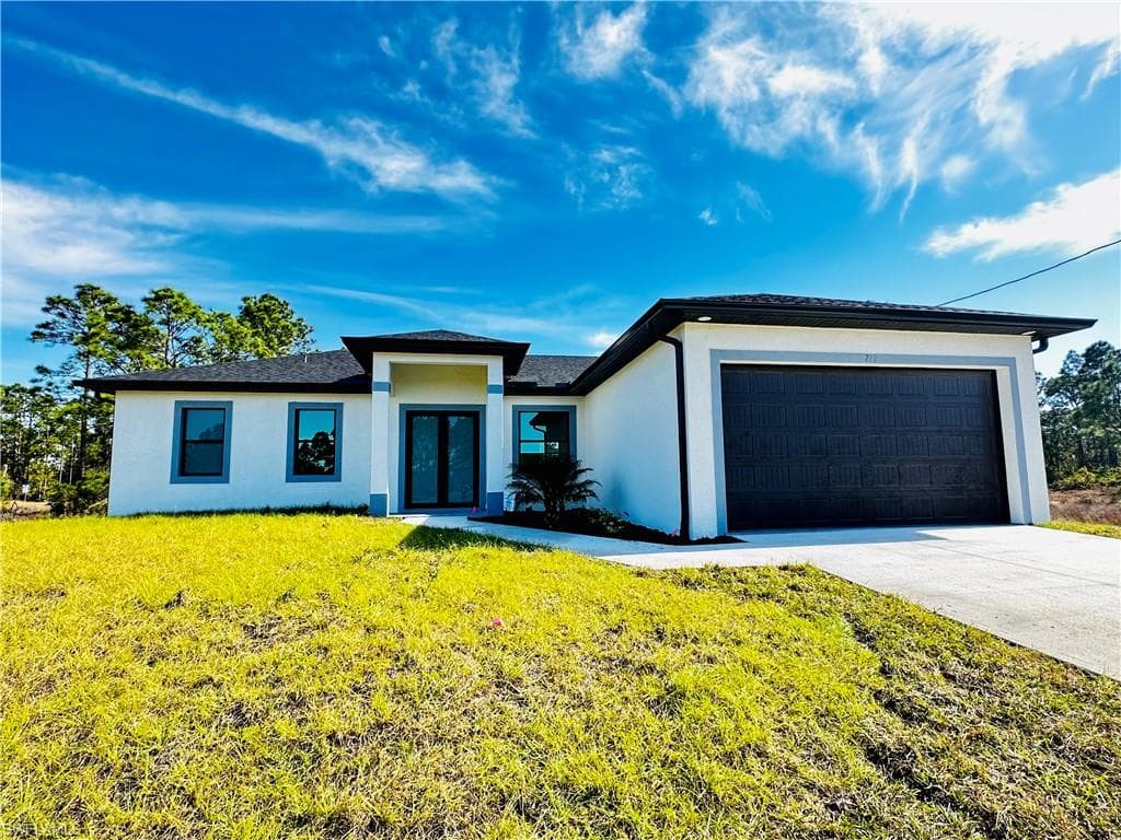 717 Genoa AVE S LEHIGH ACRES, FL 33974