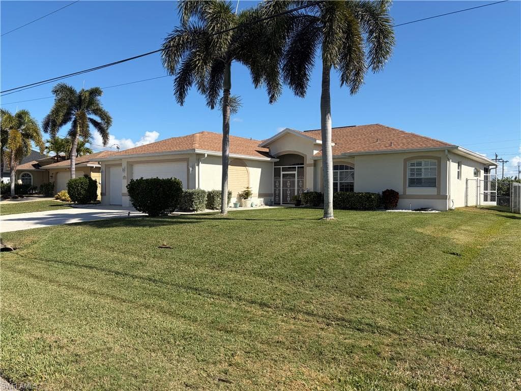 1409 SW 1st AVE CAPE CORAL, FL 33991