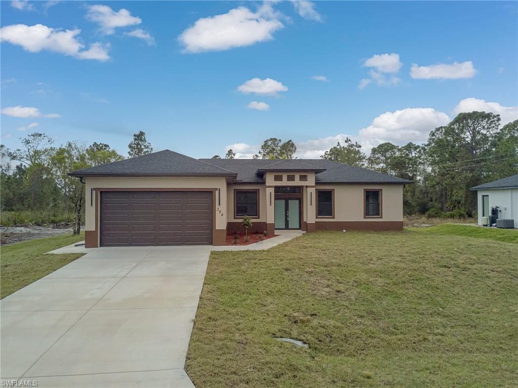 304 E 15th ST LEHIGH ACRES, FL 33972