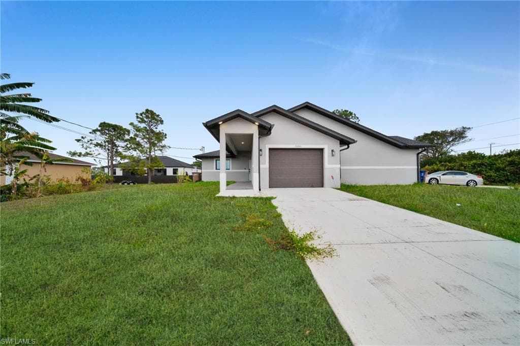 5504 BUTTE ST LEHIGH ACRES, FL 33971