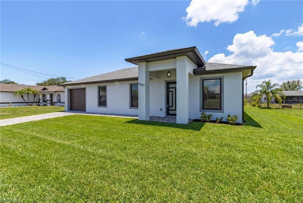 2507 26 ST SW LEHIGH ACRES, FL 33976