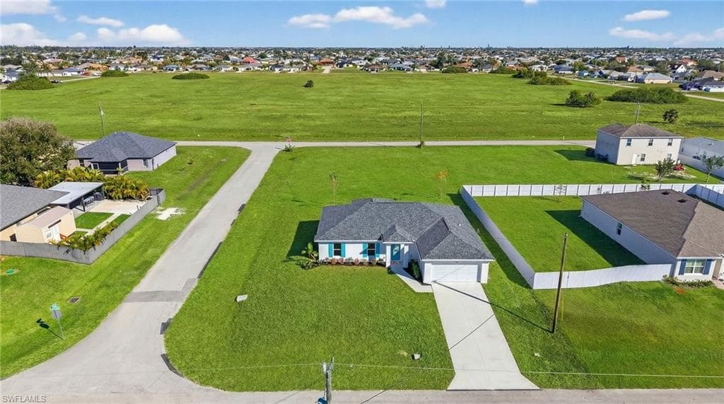 1027 NW 12th AVE CAPE CORAL, FL 33993