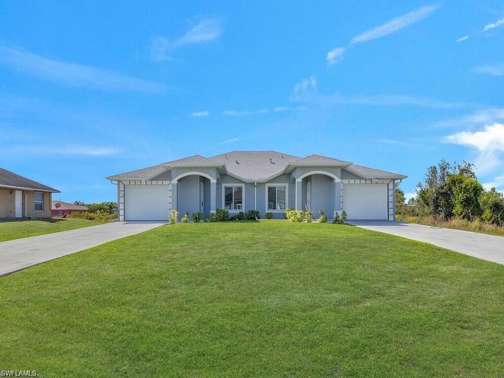716/718 Harry AVE S LEHIGH ACRES, FL 33973
