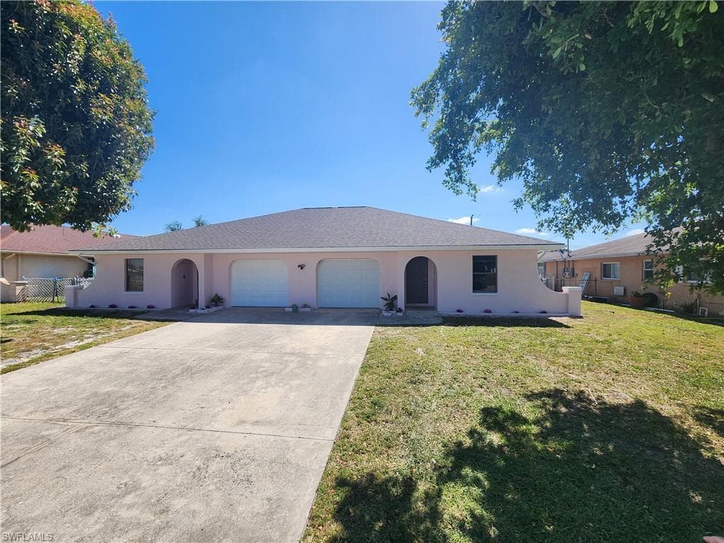 1209/1211 SE 23rd PL CAPE CORAL, FL 33990