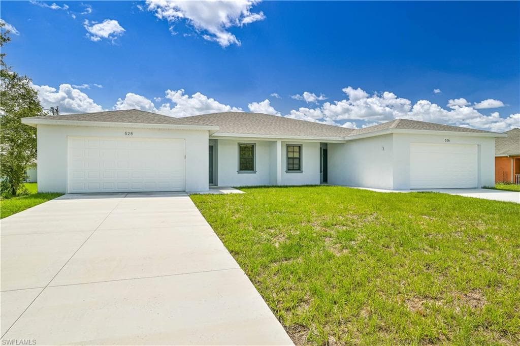 526/528 Grant BLVD LEHIGH ACRES, FL 33974