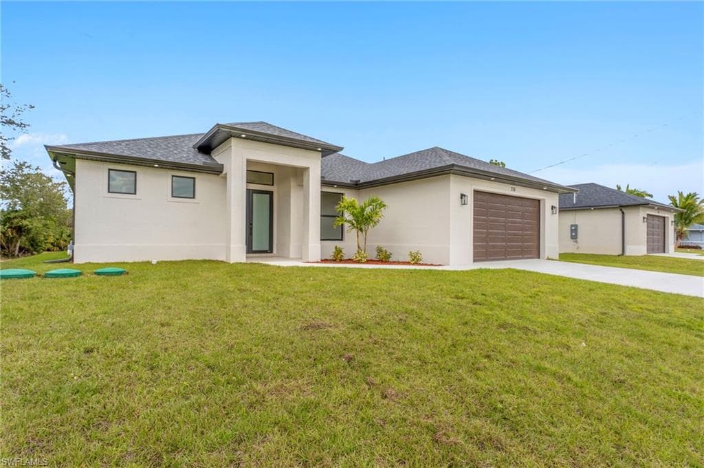 715 Theodore Vail ST E LEHIGH ACRES, FL 33974