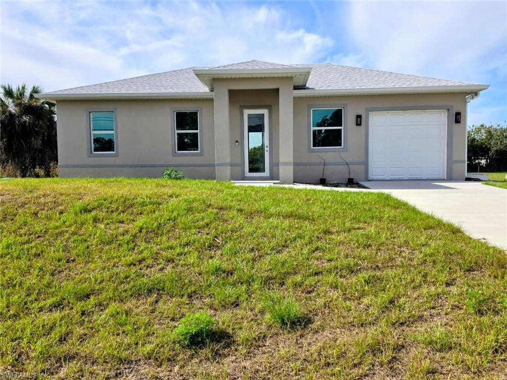402 Harrison DR LEHIGH ACRES, FL 33936