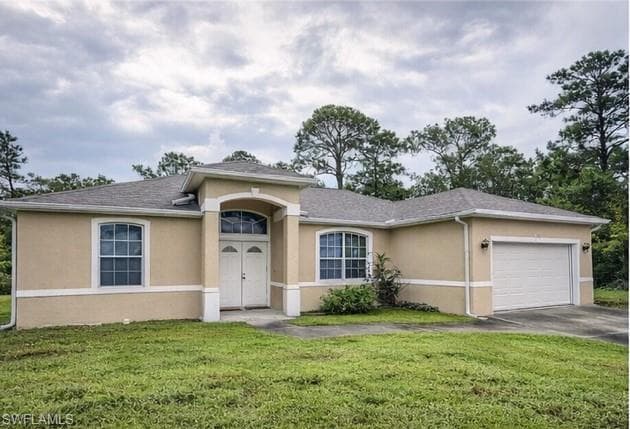 1203 Grant BLVD LEHIGH ACRES, FL 33974