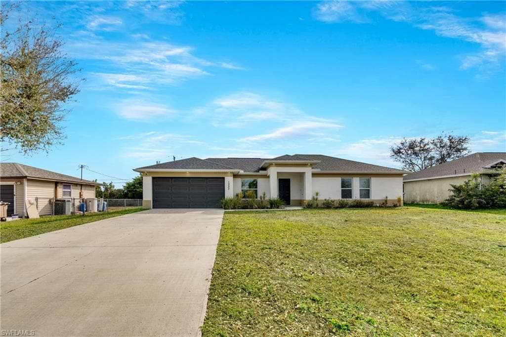 1327 NE 12th AVE CAPE CORAL, FL 33909