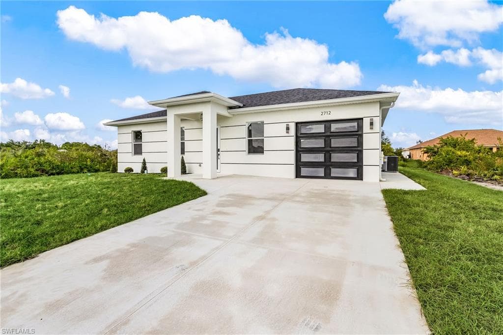 706 Theodore Vail ST E LEHIGH ACRES, FL 33974
