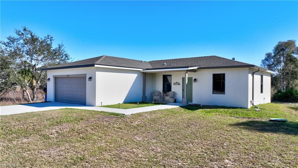 809 Bell BLVD S LEHIGH ACRES, FL 33974