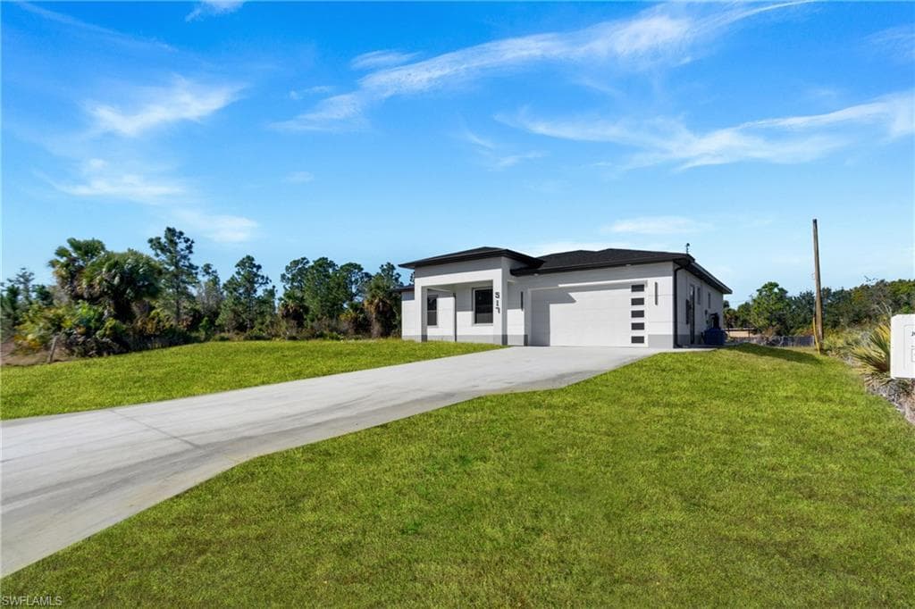 517 Johns AVE LEHIGH ACRES, FL 33972