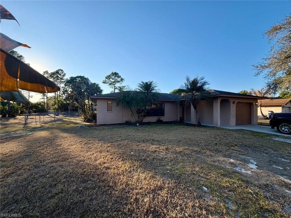 409 McArthur AVE LEHIGH ACRES, FL 33936