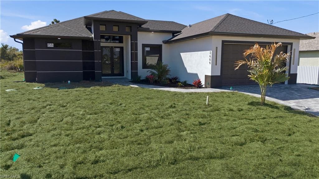 2609 11th ST SW LEHIGH ACRES, FL 33976