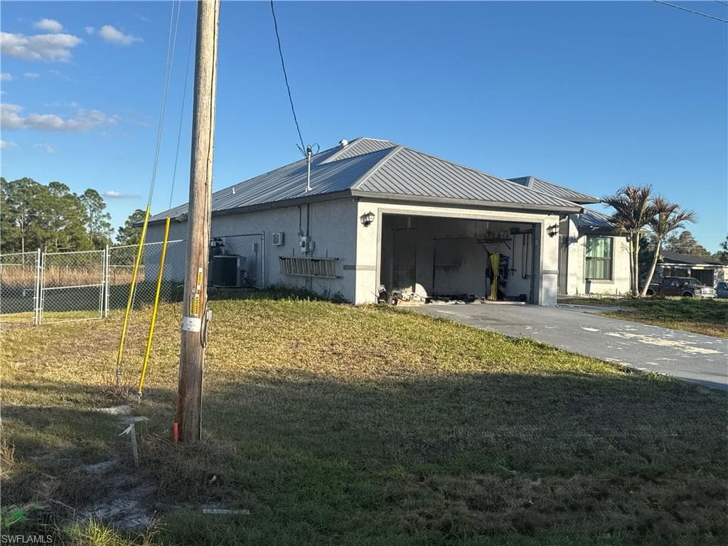 717 Fleming AVE S LEHIGH ACRES, FL 33974