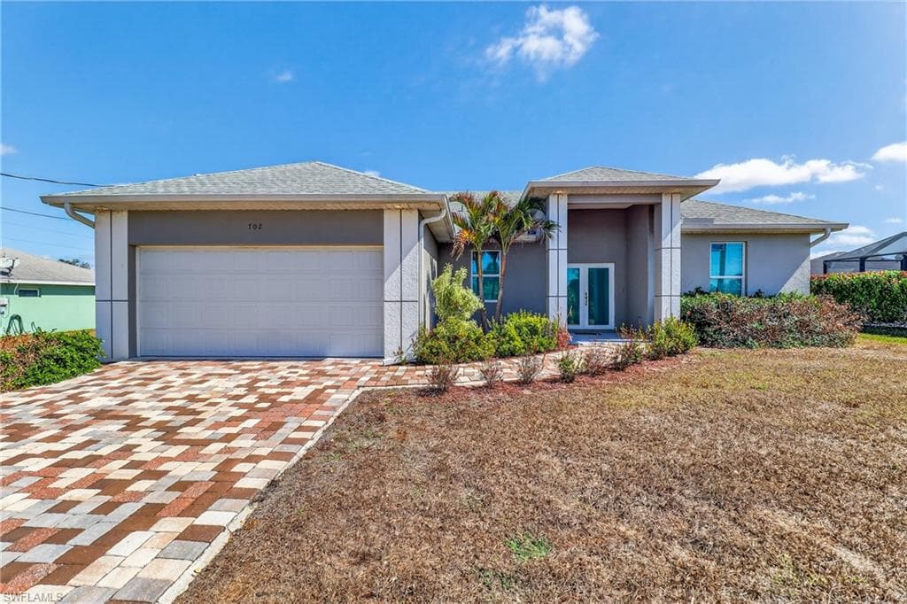 702 NORMAN AVE N LEHIGH ACRES, FL 33971