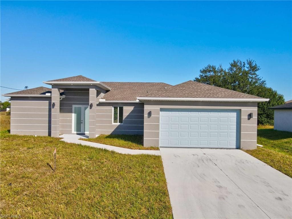 2716 25TH ST SW LEHIGH ACRES, FL 33976