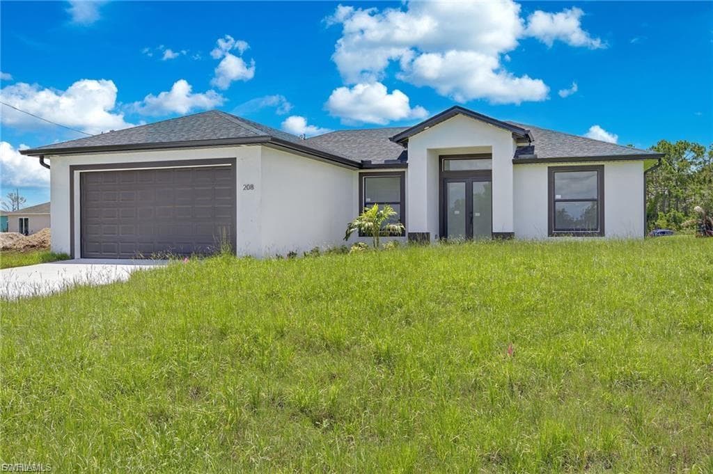 208 PEMBROKE ST ST LEHIGH ACRES, FL 33974
