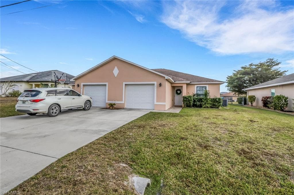 702/704 SE 6th TER CAPE CORAL, FL 33990